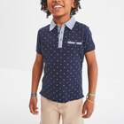 Polo manches courtes 1 poche bleu marine garçon en promo chez La Halle Polo manches courtes 1 poche bleu marine garçon dans le catalogue La Halle
