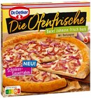 Die Ofenfrische Schinken-Sauerrahm oder Pizza Tradizionale Salame Romano bei REWE im Eching Prospekt für 2,22 €