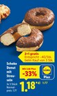 Schoko Donut mit Streuseln für 1,18 € bei Lidl im Angebot Schoko Donut mit Streuseln im aktuellen Lidl Prospekt