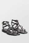 Sandales cloutées en cuir dans le catalogue Monoprix Margaret