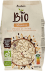 Promo AUCHAN BIO MUESLI FRUITS ET BAIES à 3,72 € dans le catalogue Auchan Hypermarché à Semécourt