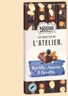 Tablette de chocolat les recettes de l'atelier noir myrtilles amandes et noisettes - NESTLÉ en promo chez Intermarché Super Tablette de chocolat les recettes de l'atelier noir myrtilles amandes et noisettes - NESTLÉ dans le catalogue Intermarché Super