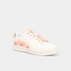 Promo Tennis basses à lacets orange corail femme à 14,99 € dans le catalogue La Halle à Haguenau