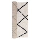 Tapis shaggy Marthe 100x150cm beige et noir en promo chez Gifi Amiens à 12,00 €