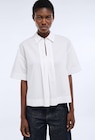 Blouse manches courtes unie en coton BIO GOTS - Monoprix Losserand à Montrouge Blouse manches courtes unie en coton BIO GOTS en promo chez Monoprix Losserand Montrouge à 23,99 €