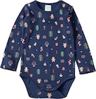 Body Langarm mit Weihnachts-Muster, blau, Gr. 74/80 bei dm-drogerie markt im Prospekt "" für 6,90 €