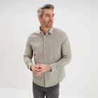 Promo Chemise manches longues coton vert kaki homme à 18,19 € dans le catalogue La Halle à Revin