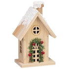 Promo Maison en bois avec led h18cm à 4,99 € dans le catalogue B&M à Plaisir