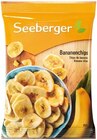 Blaue Weinbeeren oder Bananenchips im Angebot bei REWE in Augsburg Blaue Weinbeeren oder Bananenchips Angebote von Seeberger bei REWE Augsburg für 1,11 €