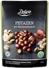 Schokonuesse im Lidl Prospekt Nüsse in Milchschokolade von Deluxe im aktuellen Lidl Prospekt