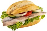 Aktuelle Fertiggerichte Angebote bei REWE in Bonn Aktuelles Matjes-Filet im Brötchen Angebot bei REWE in Bonn ab 2,39 €