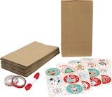 Adventskalender mit Papiertüten, Satinband, Aufkleber & Washitape bei dm-drogerie markt im Prospekt "" für 8,95 €