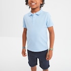 Polo manches courtes à détail brodé bleu pastel garçon en promo chez La Halle Polo manches courtes à détail brodé bleu pastel garçon dans le catalogue La Halle