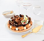 TARTE COURONNE PROFITEROLES DE PÂQUES - SANS MARQUE en promo chez Auchan Hypermarché TARTE COURONNE PROFITEROLES DE PÂQUES - SANS MARQUE dans le catalogue Auchan Hypermarché