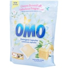 Capsules de lessive Omo Savon de Marseille et fleurs de printemps - Omo en promo chez Action Amiens à 7,79 €