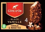 Promo BÂTONNET DE GLACE À LA VANILLE ENROBÉ DE CHOCOLAT ET NOISETTES X4 à 2,44 € dans le catalogue Intermarché à Champigny