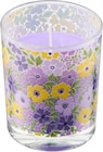 Duftkerze im Glas mit Blumen bei dm-drogerie markt im Prospekt "" für 2,45 €