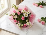 Bouquet de roses et lisianthus à Carrefour dans Varen