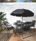 Table de jardin rectangulaire - 4 chaises et un parasol inclus à 99,99 € dans le catalogue Maxi Bazar