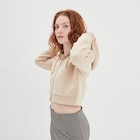 Promo Sweat zippé à capuche court sable femme à 17,99 € dans le catalogue La Halle à Civrieux-d'Azergues