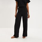 Pantalon large gaufré taille élastiquée noir femme - La Halle à Caen Pantalon large gaufré taille élastiquée noir femme en promo chez La Halle Caen à 19,99 €