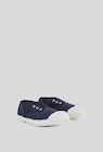 Tennis Bensimon unies en coton dans le catalogue Monoprix Margaret