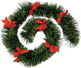 Guirlande de Noël verte avec nœuds rouges - ATMOSPHERA en promo chez Intermarché Hyper Guirlande de Noël verte avec nœuds rouges - ATMOSPHERA dans le catalogue Intermarché Hyper