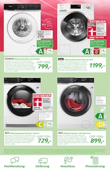 Waschmaschine im EP: Prospekt "WOHNZIMMER MEISTERSCHAFT - wir laufen uns schon warm!" mit 12 Seiten (Stendal (Hansestadt))