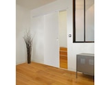 Promo Kit porte coulissante + système coulissant 204x83 cm porte alvéolaire pré-peinte à 79,90 € dans le catalogue Brico Dépôt à Lexy