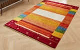 Wollteppich „Sehnsucht nach Eden“ & „Colourful“ Angebote von Cazaris bei XXXLutz Möbelhäuser Neubrandenburg für 89,99 €