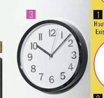 Horloge Ø 22cm en plastique noir  dans le catalogue Géant Casino