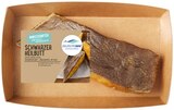 Aktuelle Fisch Angebote bei REWE in Darmstadt Aktuelles Schwarzer Heilbutt Angebot bei REWE in Darmstadt ab 22,90 €