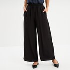 La Halle Fourmies - Promo Pantalon large fluide taille élastiquée noir femme Promo Pantalon large fluide taille élastiquée noir femme à 7,00 € dans le catalogue La Halle à Fourmies
