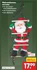 Weihnachtsmann mit Leiter im aktuellen Netto Marken-Discount Prospekt