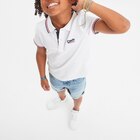 Polo manches courtes coton Creeks blanc garçon en promo chez La Halle Polo manches courtes coton Creeks blanc garçon dans le catalogue La Halle