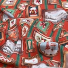 Tissu toile 100% coton imprimé de Noël rouge 140 cm dans le catalogue Décor Discount