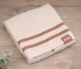 Serviette de toilette Louise dans le catalogue Maxi Bazar