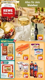 REWE Prospekt mit 32 Seiten