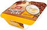 Joghurt mit der Ecke Schoko Flakes von Müller im aktuellen REWE Prospekt für 0,33 €