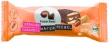 Haferriegel Erdnuss Karamell im Angebot bei REWE in Neustadt Haferriegel Erdnuss Karamell Angebote von Haselherz bei REWE Neustadt für 1,39 €