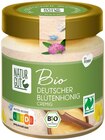 Bio deutscher Blütenhonig im Angebot bei Penny in Würzburg Bio deutscher Blütenhonig Angebote von Naturgut bei Penny Würzburg für 3,99 €