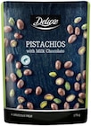 Pistaches ou noix enrobées de chocolat au lait - DELUXE en promo chez Lidl Niort à 2,79 €