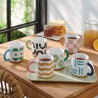 Mug en grès modèle à choix en promo chez Super U Mug en grès modèle à choix dans le catalogue Super U