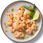 Crevettes cuites et décortiquées ASC recette ail et fines herbes en promo chez Lidl Gennevilliers à 3,99 €