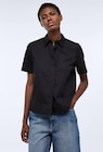 Chemise polo manches courtes en coton bi-matière - Monoprix Margaret Chemise polo manches courtes en coton bi-matière à 16,79 € dans le catalogue Monoprix Margaret