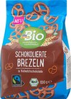 schokolierte Brezeln von dmBio für 1,95 € bei dm-drogerie markt im Angebot schokolierte Brezeln von dmBio im aktuellen dm-drogerie markt Prospekt