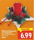 Weihnachtsgesteck auf Holzstern im aktuellen E center Prospekt