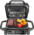 WOODFIRE OG701 DE Elektrischer Outdoor Grill von Ninja für 199,00 € bei MediaMarkt Saturn im Angebot WOODFIRE OG701 DE Elektrischer Outdoor Grill von Ninja im aktuellen MediaMarkt Saturn Prospekt