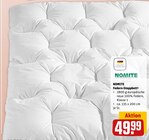 Federn-Steppbett³ im Angebot bei REWE in Rodgau Federn-Steppbett³ Angebote von NOMITE bei REWE Rodgau für 49,99 €