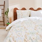 Parure de lit "Camélia" en promo chez Carrefour Massy à 29,99 €